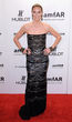 Heidi Klum in einer trägerlosen Robe von Calvin Klein