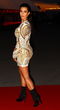 Kim Kardashian kombiniert Stiefel zum edlen Gold-Dress Kim Kardashian kombiniert Stiefel zum edlen Gold-Dress