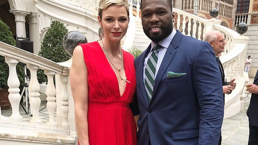 Fürstin Charlène von Monaco und 50 Cent bei einem Empfang