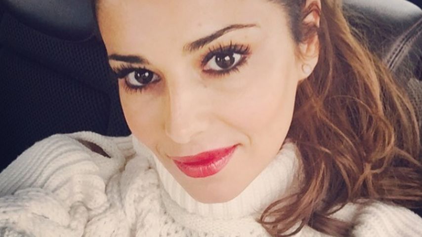 Cheryl mit rotem Lippenstift