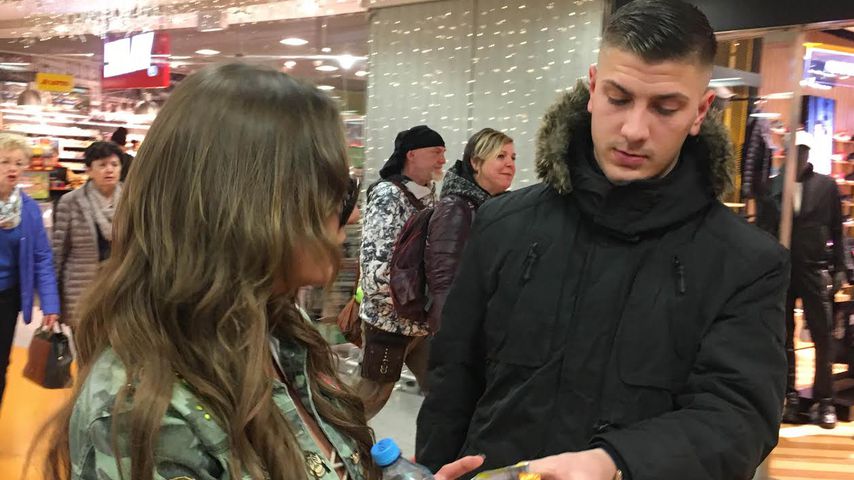 Gina-Lisa Lohfink und ihr Freund Emir am Frankfurter Flughafen