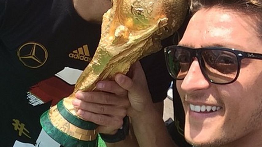 Lukas Podolski, Jérôme Boateng und Mesut Özil