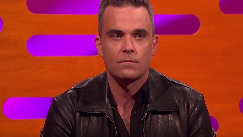 Robbie Williams schaut überrascht