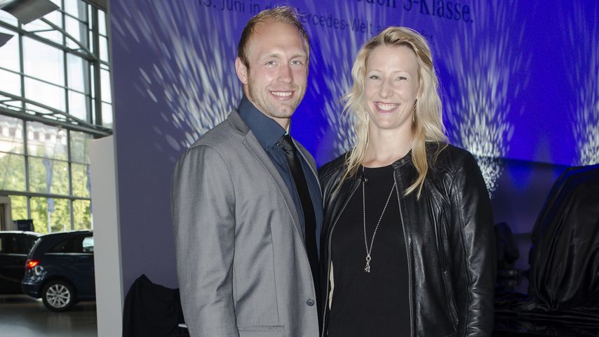 Robert Harting und Julia Fischer bei einer Autopräsentation in Berlin