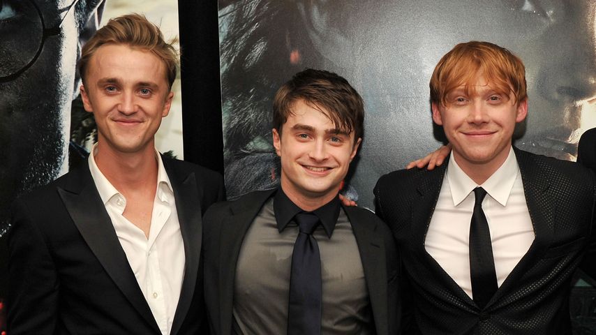 Tom Felton, Daniel Radcliffe und Rupert Grint auf einer Filmpremiere