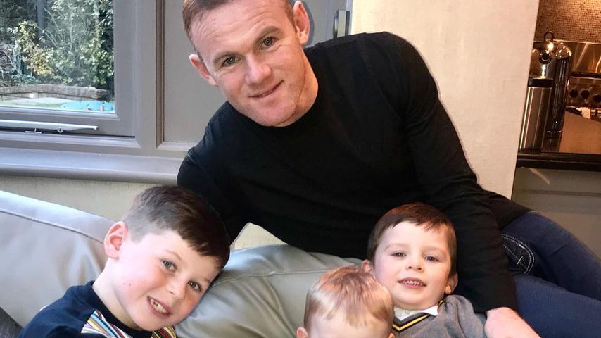 Wayne Rooney mit seinen Kindern