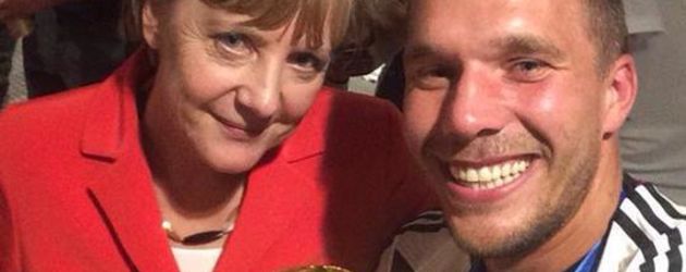 Lukas Podolski und Angela Merkel Lukas Podolski und Angela Merkel