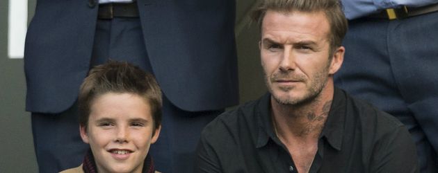 Cruz Beckham und sein Vater David beim Grand Slam Turnier in Wimbledon 2016 Cruz Beckham und sein Vater David beim Grand Slam Turnier in Wimbledon 2016