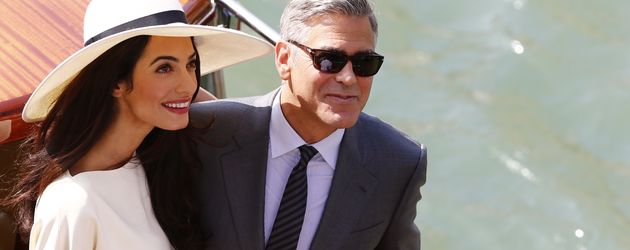 Amal Alamuddin und George Clooney während in Hochzeit in Venedig Amal Alamuddin und George Clooney während in Hochzeit in Venedig