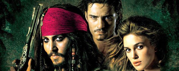 Johnny Depp, Orlando Bloom und Keira Knightley auf einem "Fluch der Karibik"-Plakat Johnny Depp, Orlando Bloom und Keira Knightley auf einem "Fluch der Karibik"-Plakat