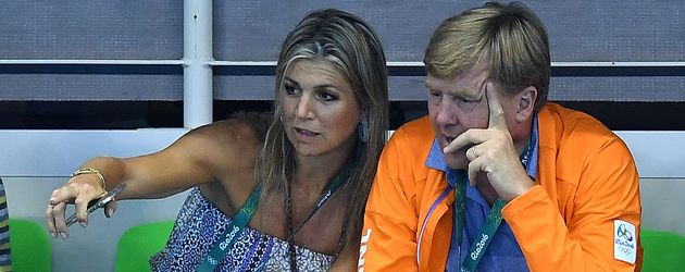 Königin Maxima und König Willem-Alexander beim 100-Meter-Lauf der Herren Königin Maxima und König Willem-Alexander beim 100-Meter-Lauf der Herren