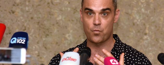 Robbie Williams bei der Pressekonferenz zur Tournee in Dublin Robbie Williams bei der Pressekonferenz zur Tournee in Dublin