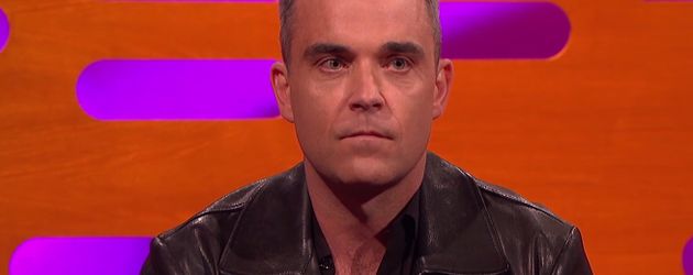Robbie Williams schaut überrascht Robbie Williams schaut überrascht