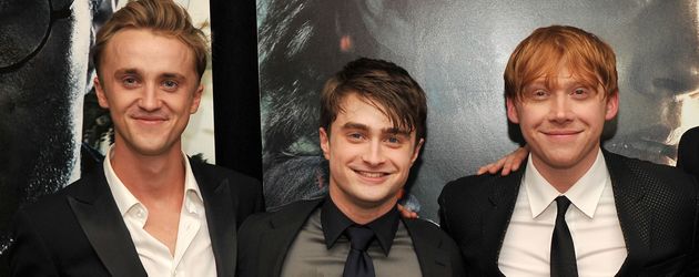 Tom Felton, Daniel Radcliffe und Rupert Grint auf einer Filmpremiere Tom Felton, Daniel Radcliffe und Rupert Grint auf einer Filmpremiere